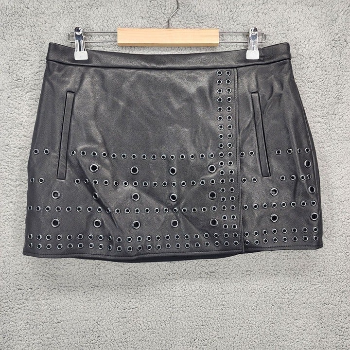 BCBGMAXAZRIA REMI Women's Size 12 Black Faux Leather Grommet Accent Mini Skirt