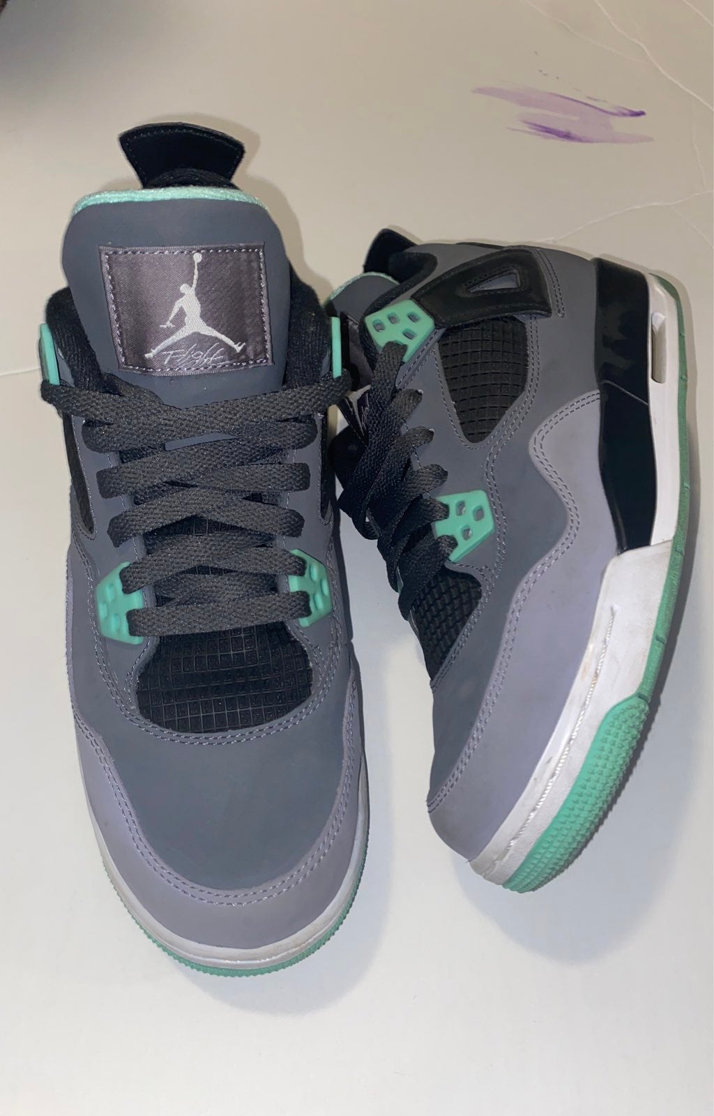 jordan 4's glow green