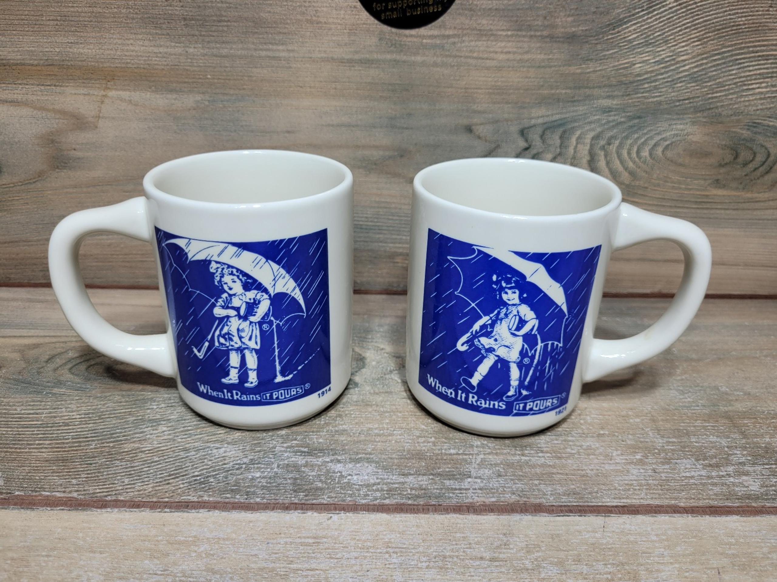 2 x Morton Salt Coffee Mugs 1914 & 1921 When It Rains It Pours