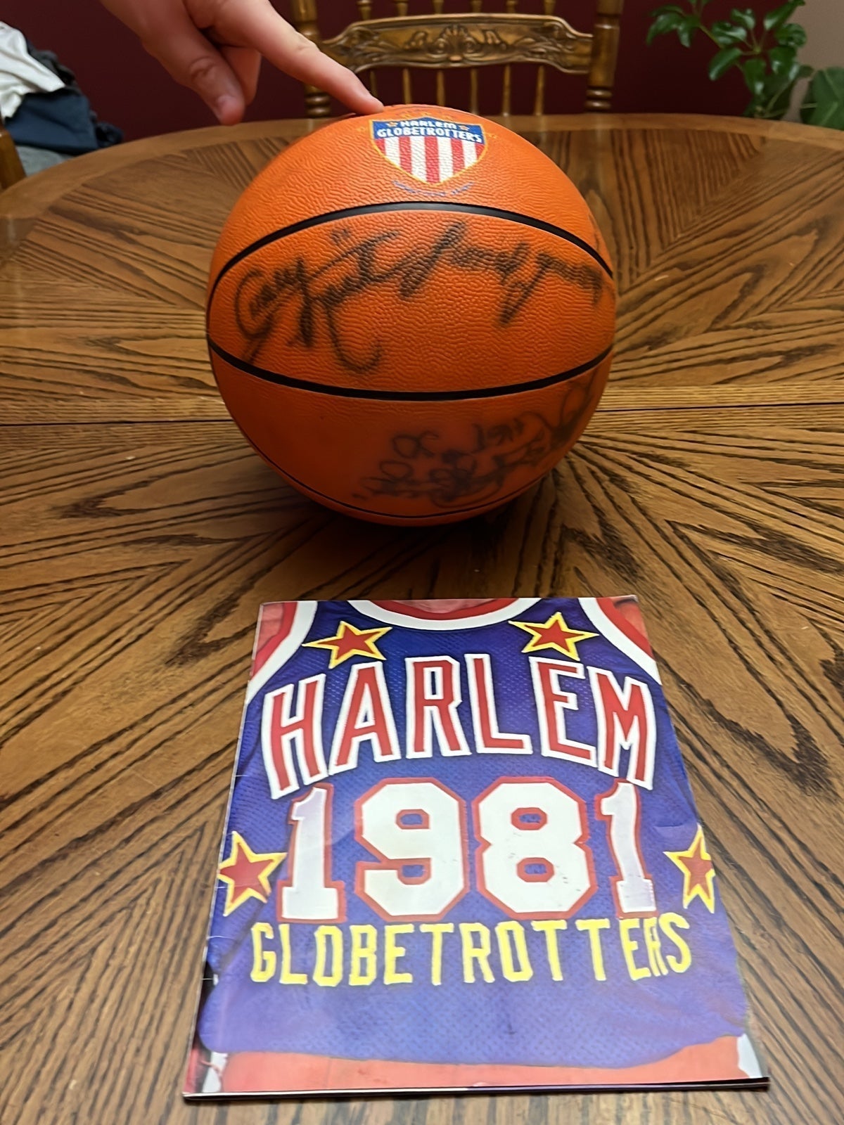 1981 Harlem Globetrotters, signed basketball and program