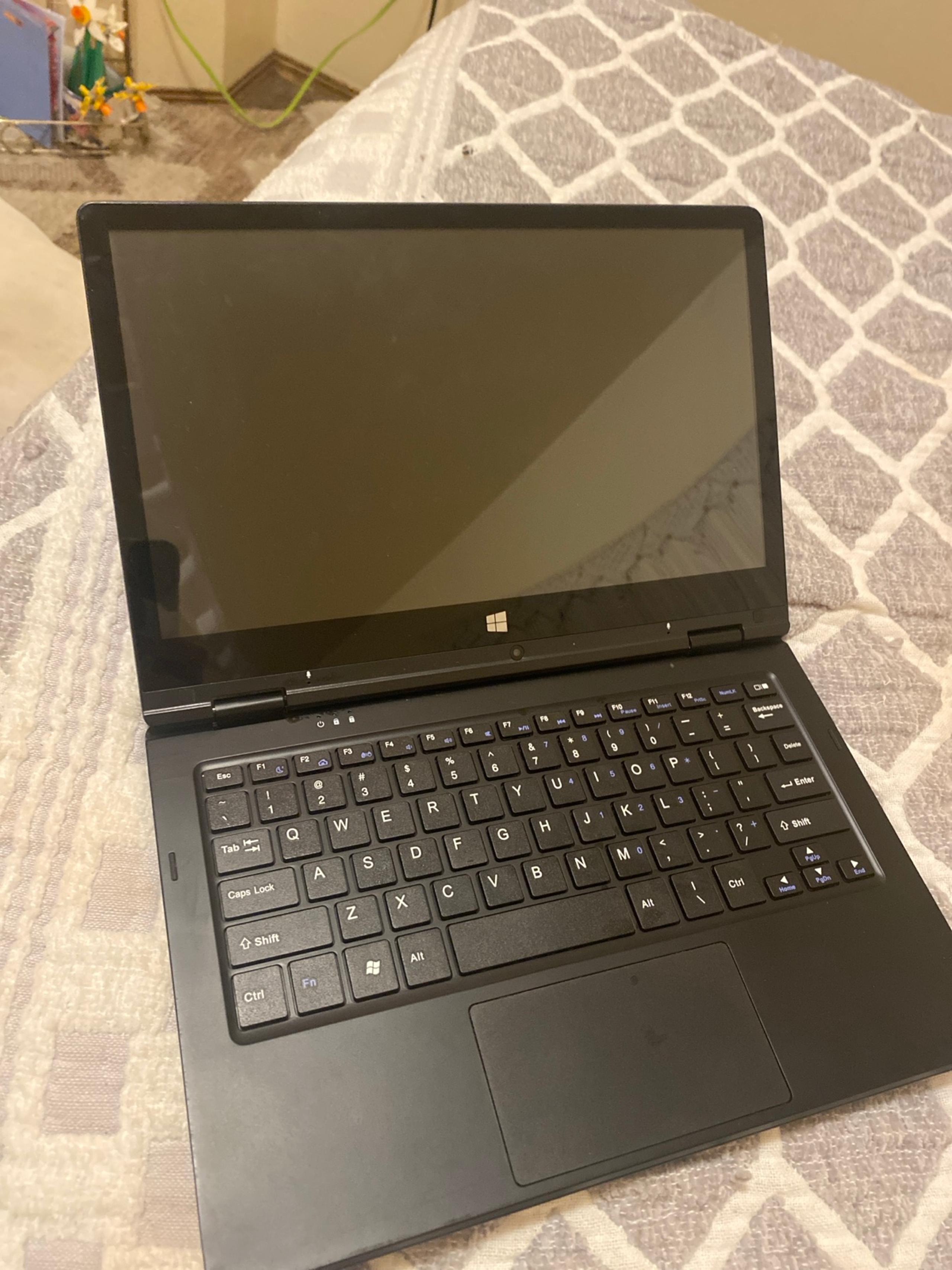 Laptop/ Tablet