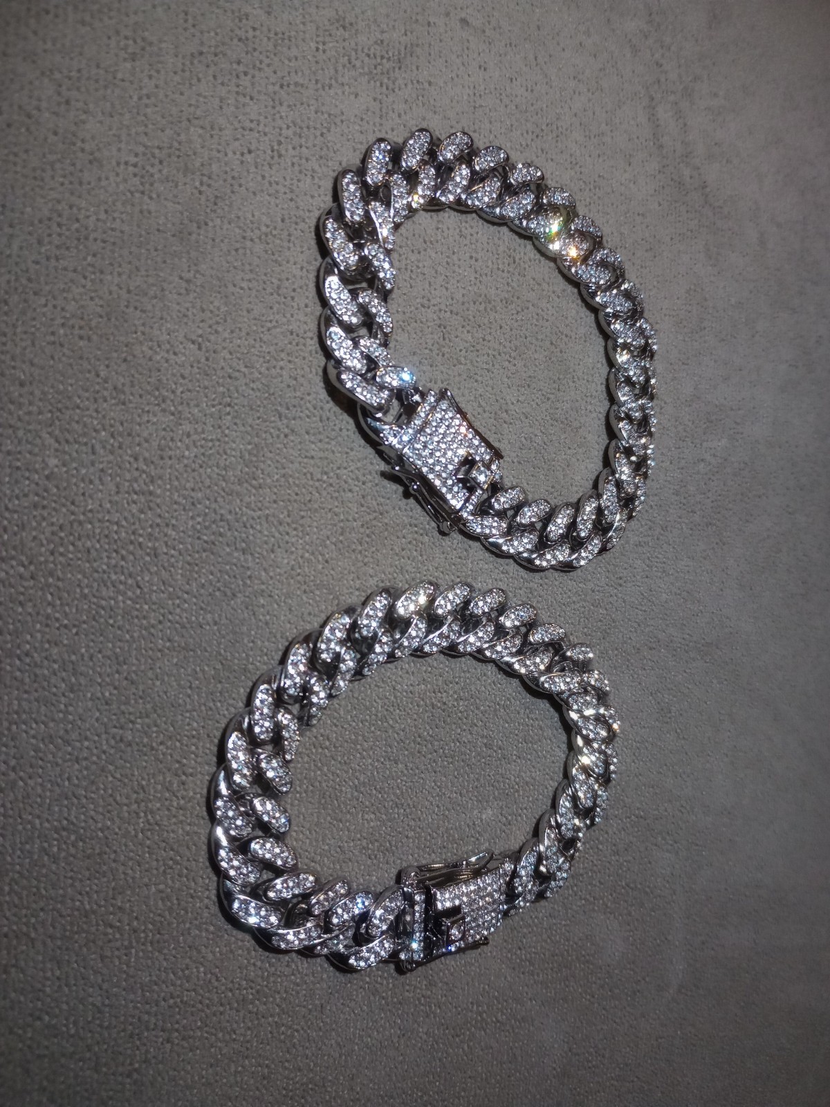 Two bracelets Real Diamonds, but they’ve been produced in the Lab. Same VVS Clar