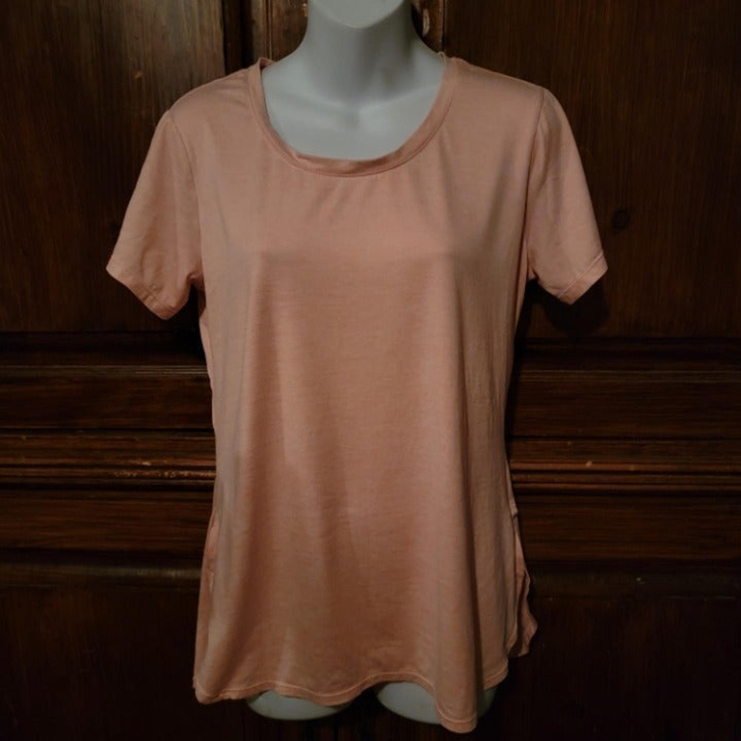 Women's size S athletic shirt by Avia