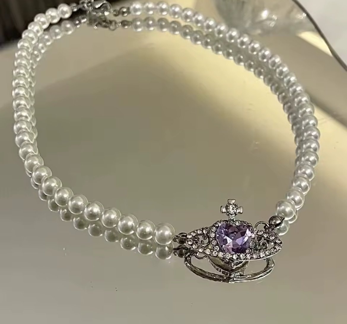 saturn pearl necklace