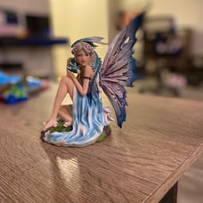 spring fairy with dragon statue