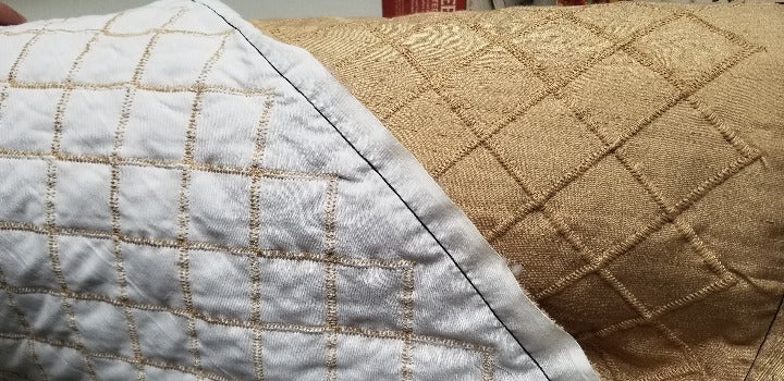 gold poly chantone quilted sold by 2 yar