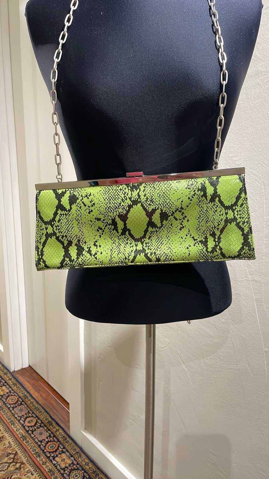 Prague Python snake print green clutch