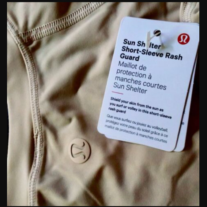 NWT Lululemon Sun Shelter SS Rash Guard sz L Relaxed UVP Lycra Beige *RARE
