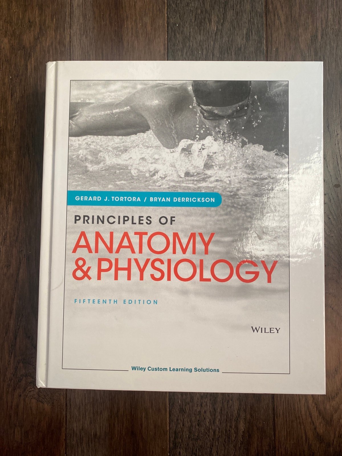 Principles of Anatomy & Physiology Textbook AND lab manual
