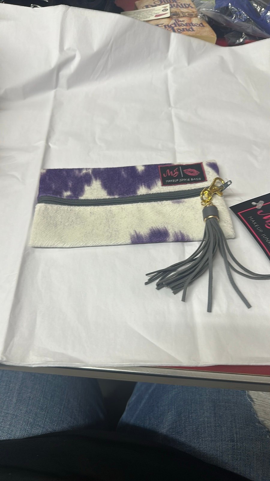 Makeup Junkie purple cow print bag