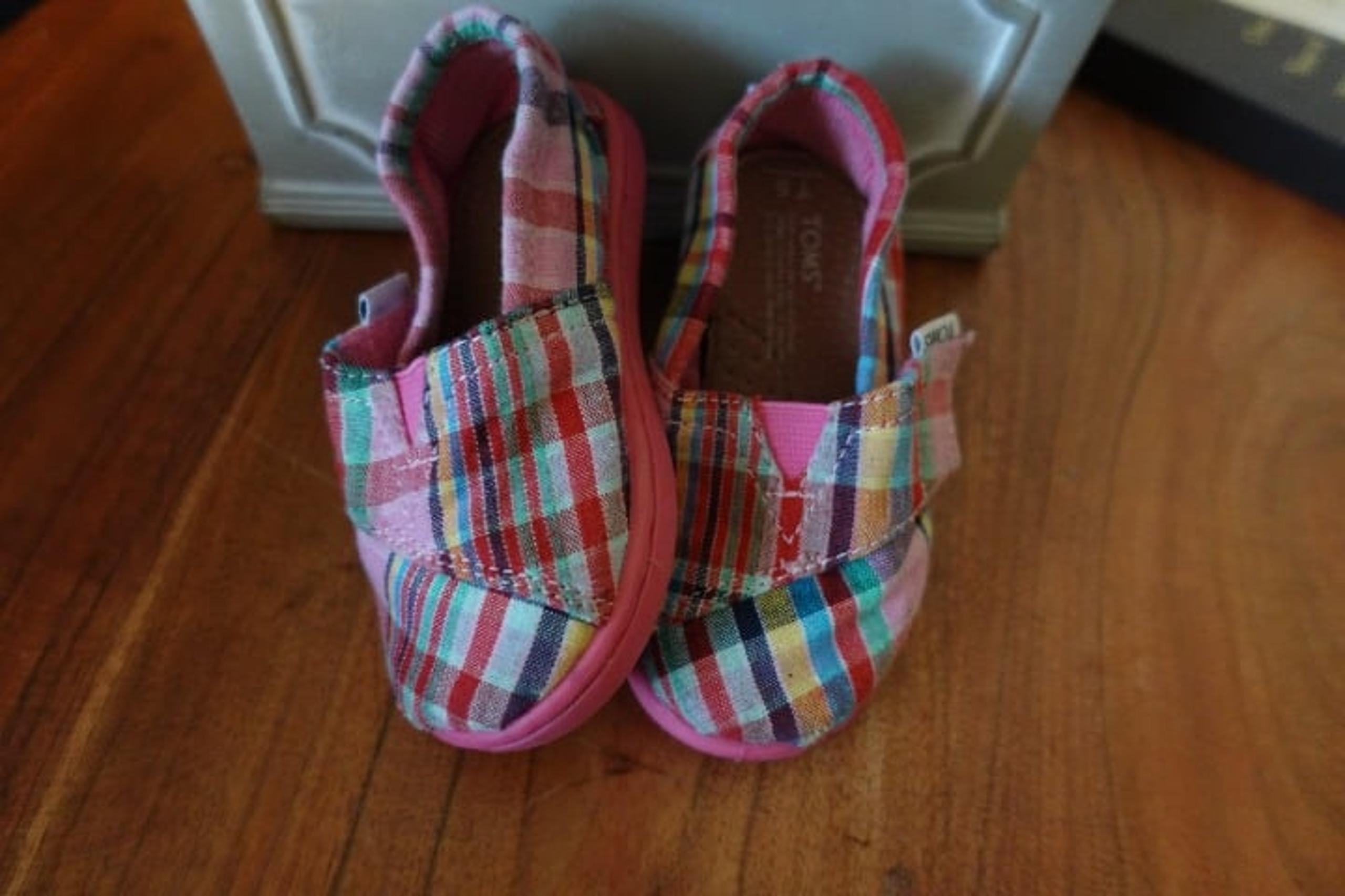 toddler TOMS shoes size 5T pink slip-ons girls