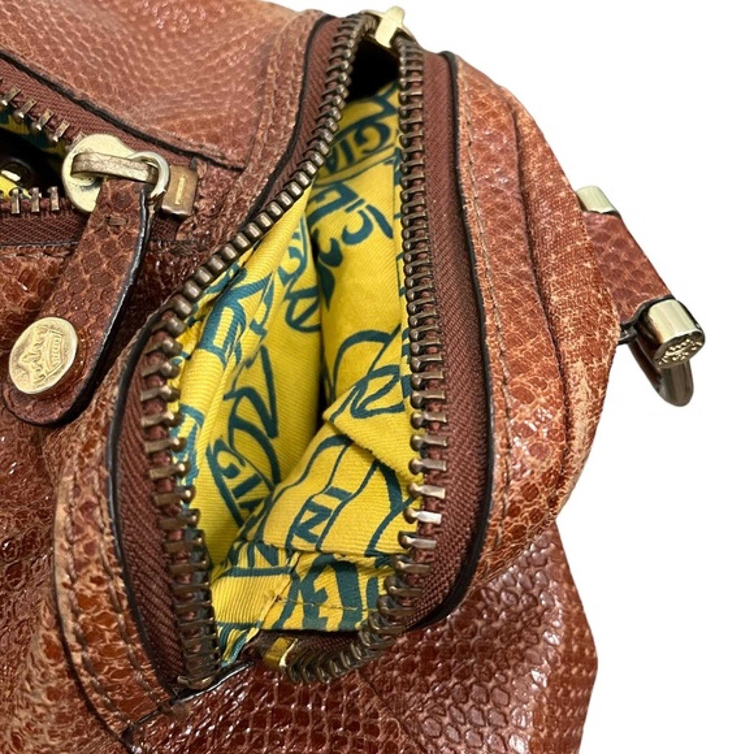 376. Gianni Bini handbag travel / overnight bag in brown faux snakeskin leather.