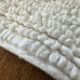 A soft and plush reversible mat