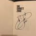 Book by and autographed Emmitt Smith
