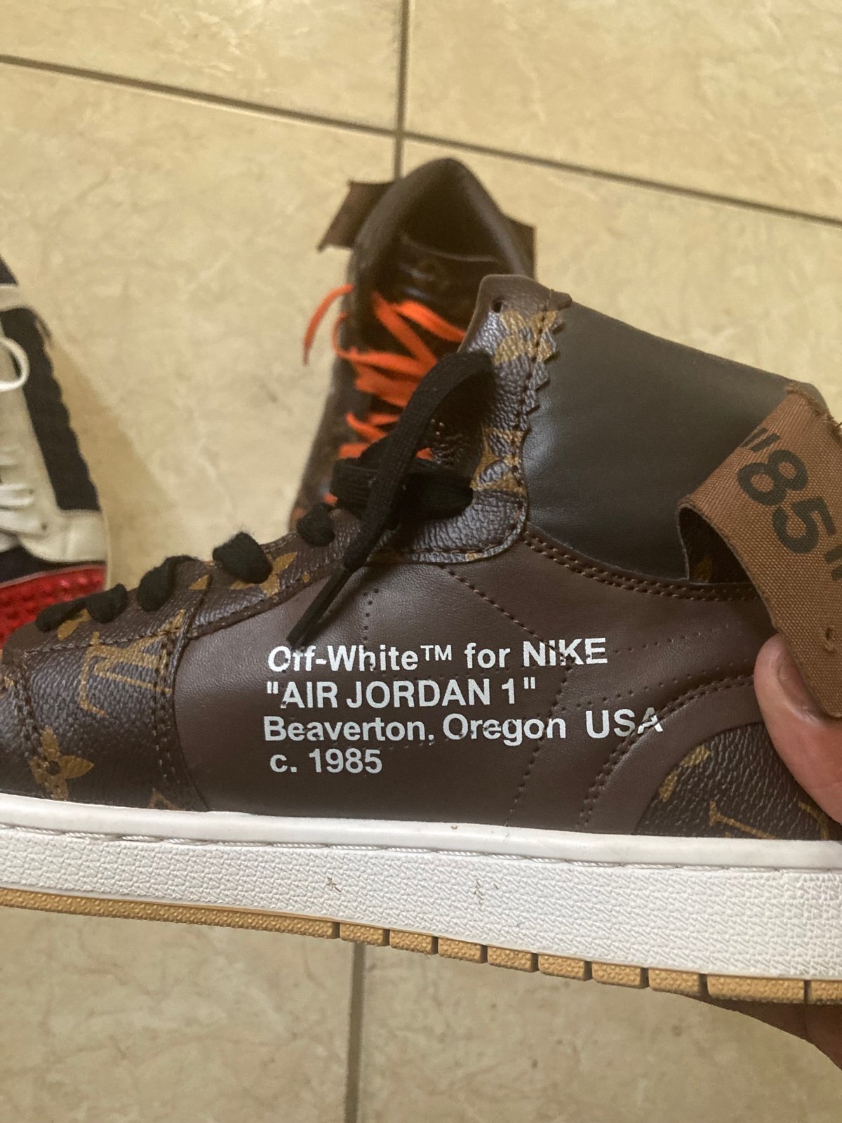 Christian louboutin red bottom high tops and off white x Louis Vuitton