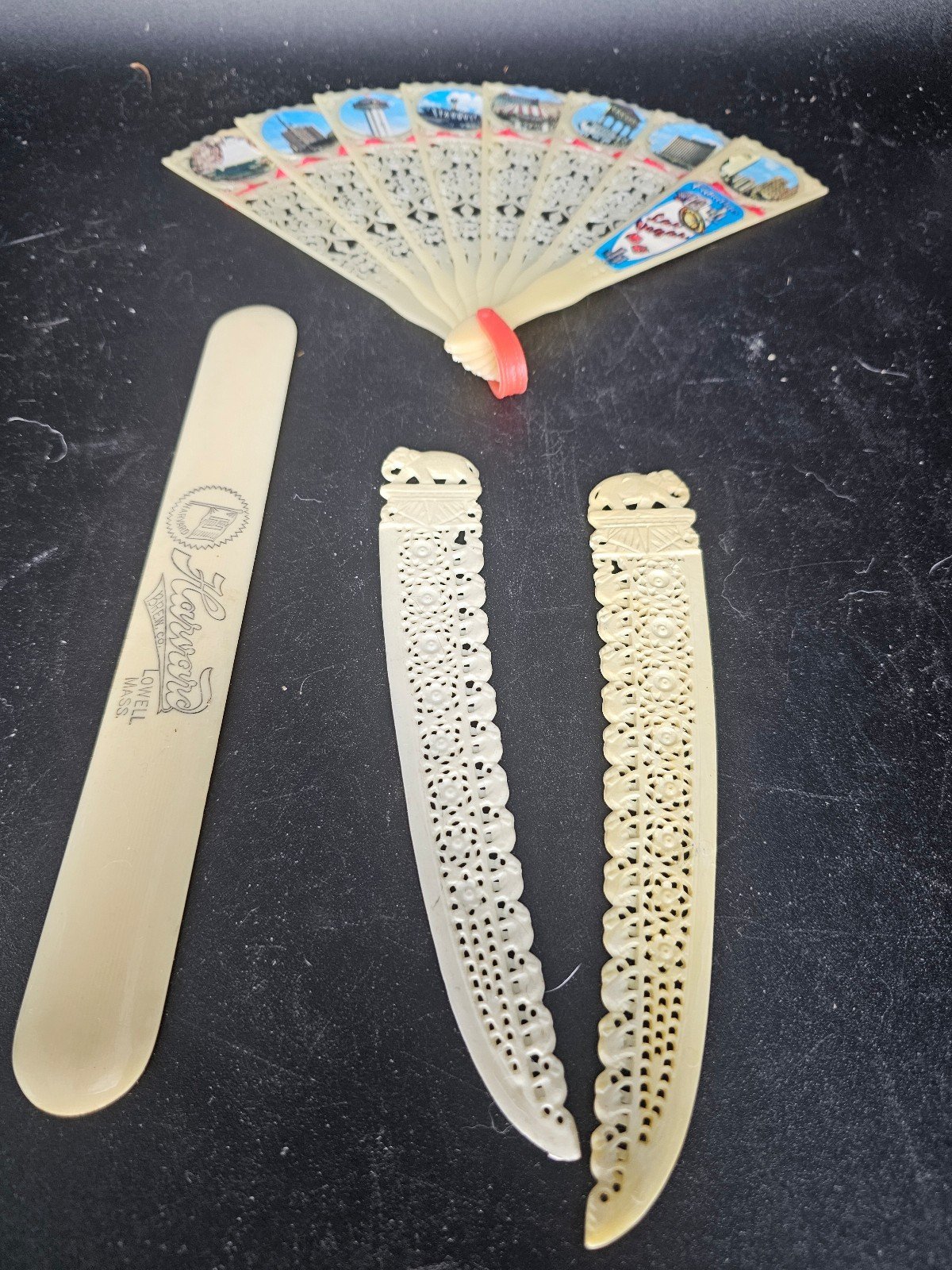 Lot of four vintage bone items