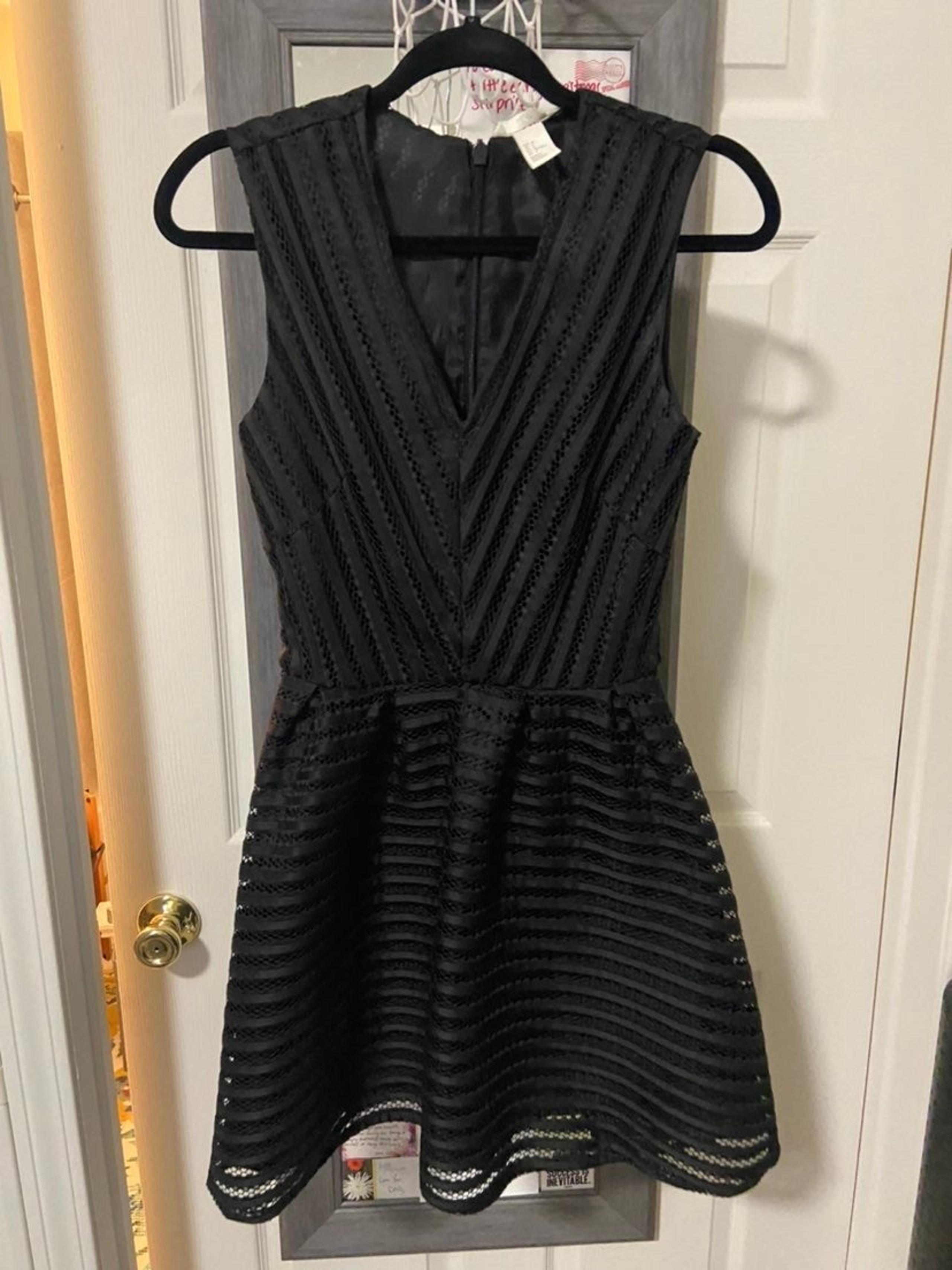 Beautiful black dress with amazing detai