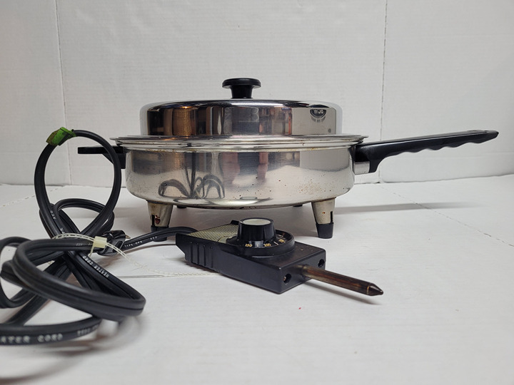 Lifetime STAINLESS STEEL ELECTRIC SKILLET LIFETIME WEST BEND WISCONSIN USA