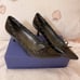 Stuart Weitzman “Whippy” Leather Kitten Heel Pumps in Black