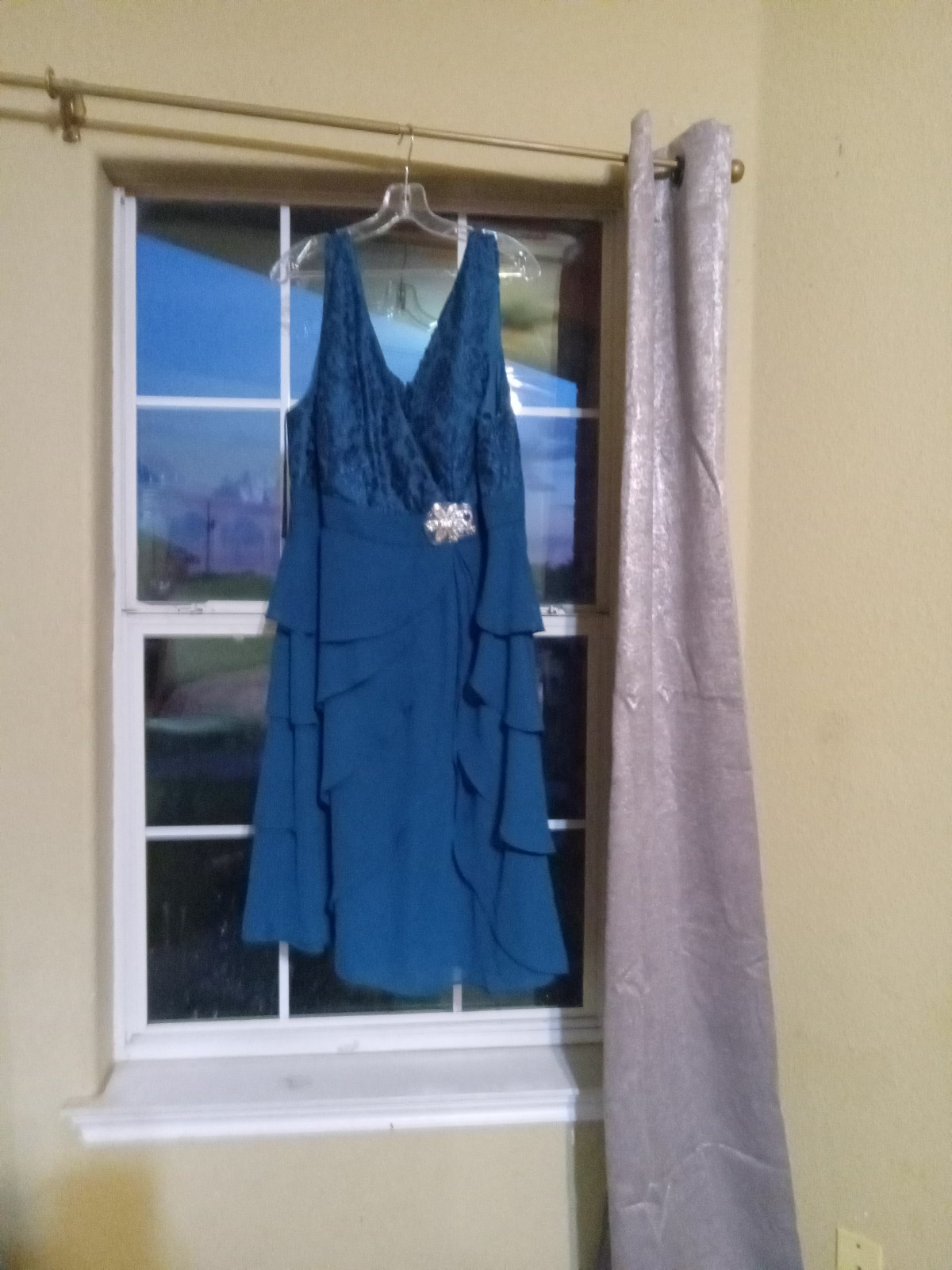 A beautiful sage green dress that didn't sadly fit me but might be a fit for u