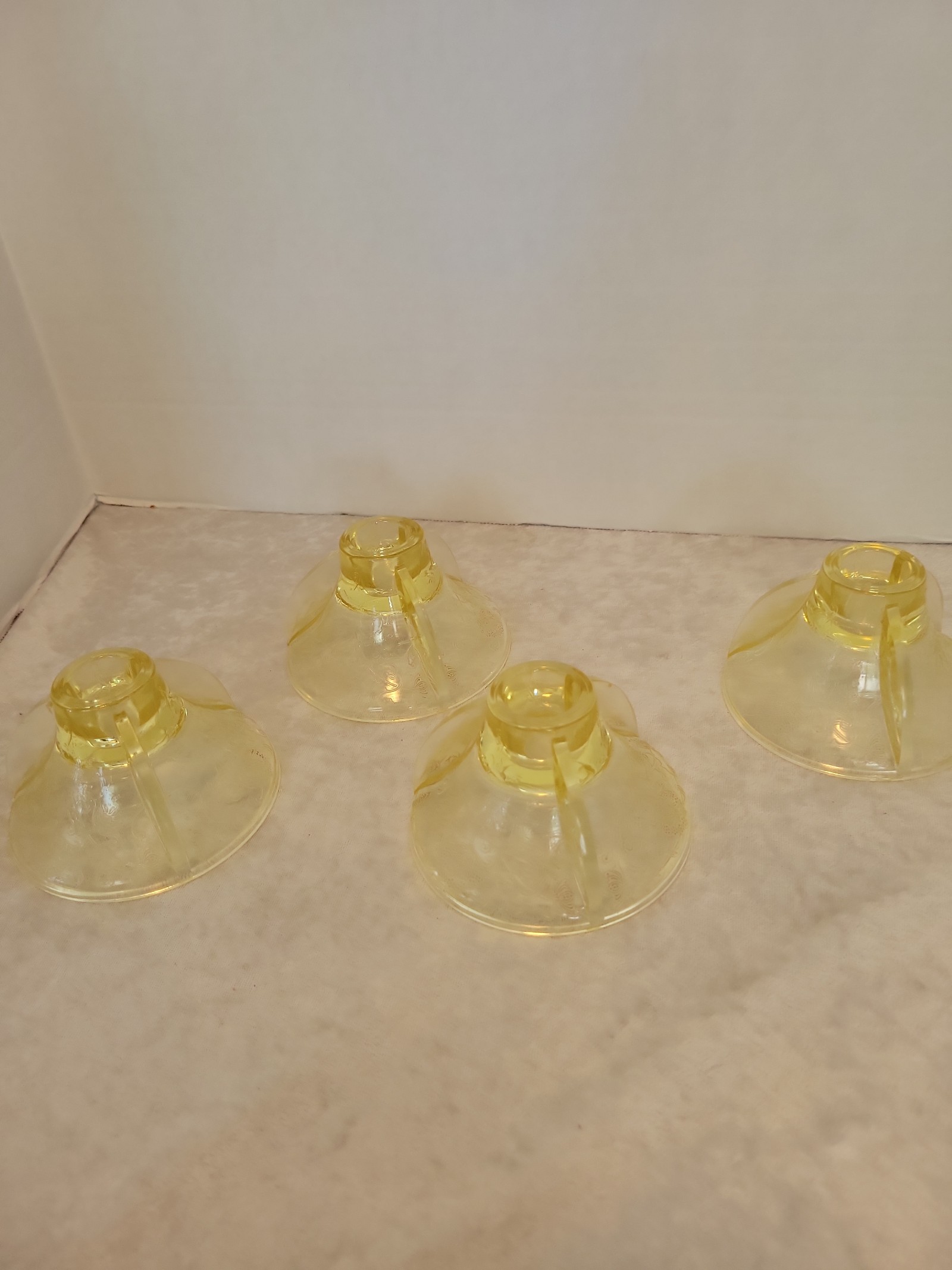 Lot of 4 vintage depression glass yellow candlesticks. SHLF GG