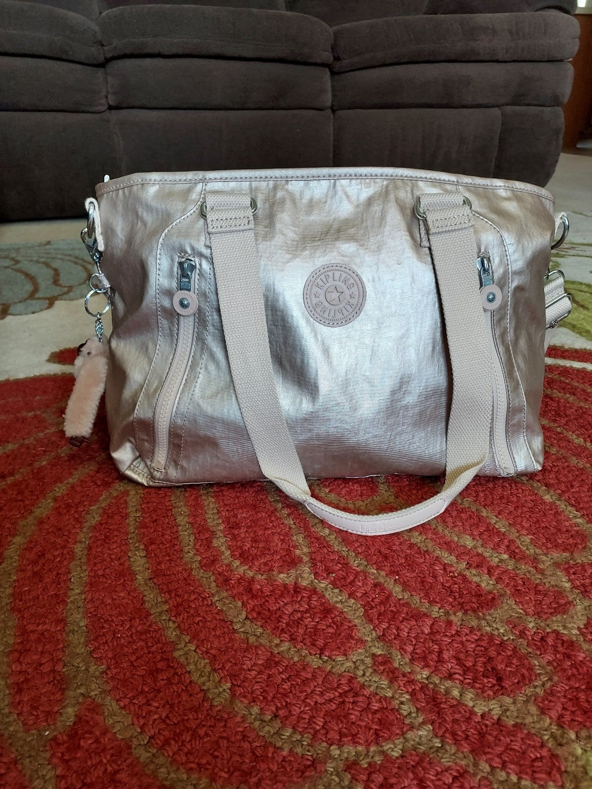 Metallic pewter kipling shop