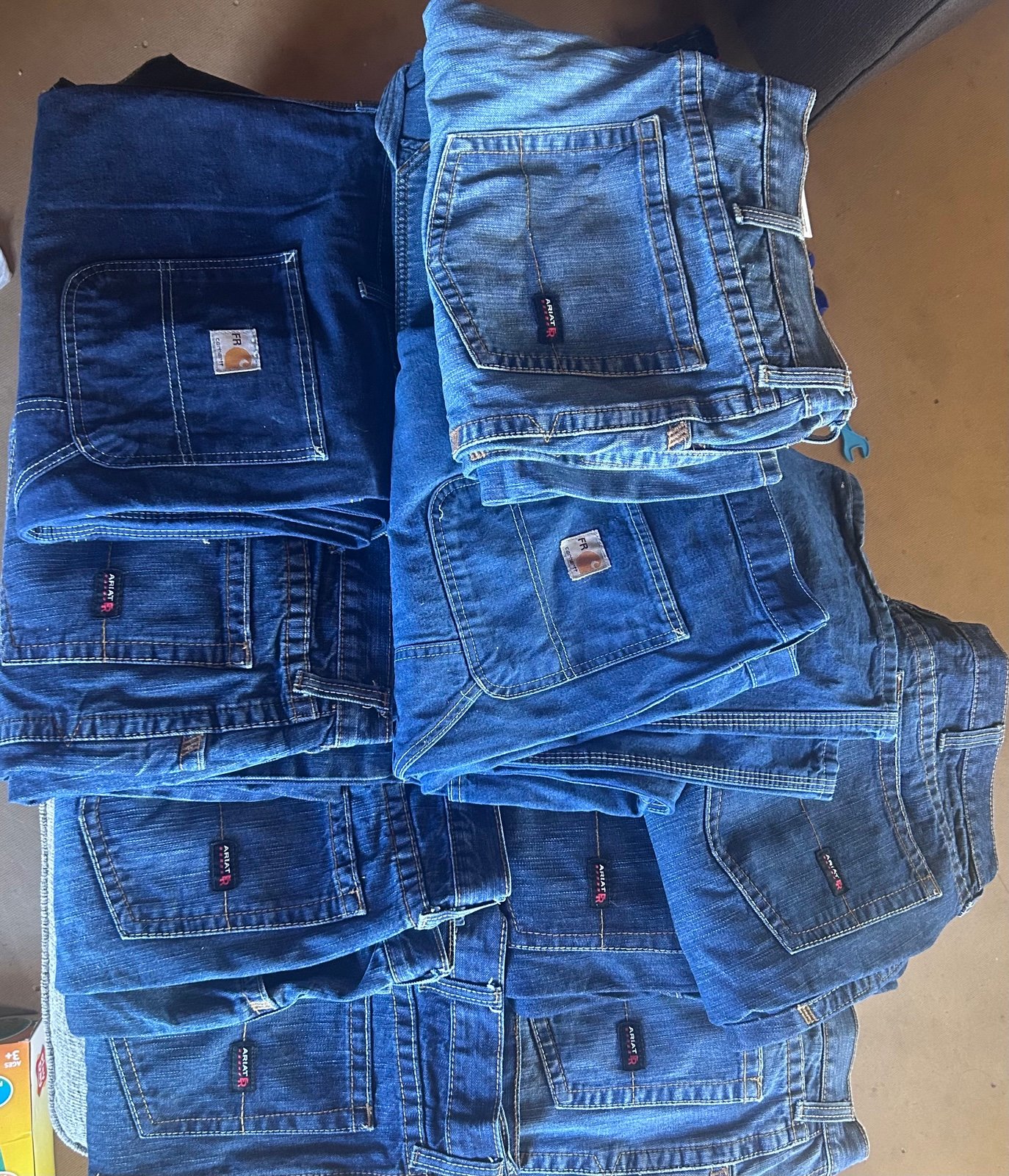 7 pairs of Ariat jeans