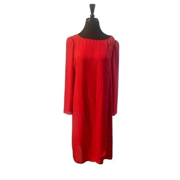It’s a Miss Rich vintage dress, Size 12