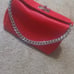 viola castellani Red Cross body or shoulder bag with chain