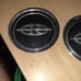 2 buick Riviera wire hubcap emblems
