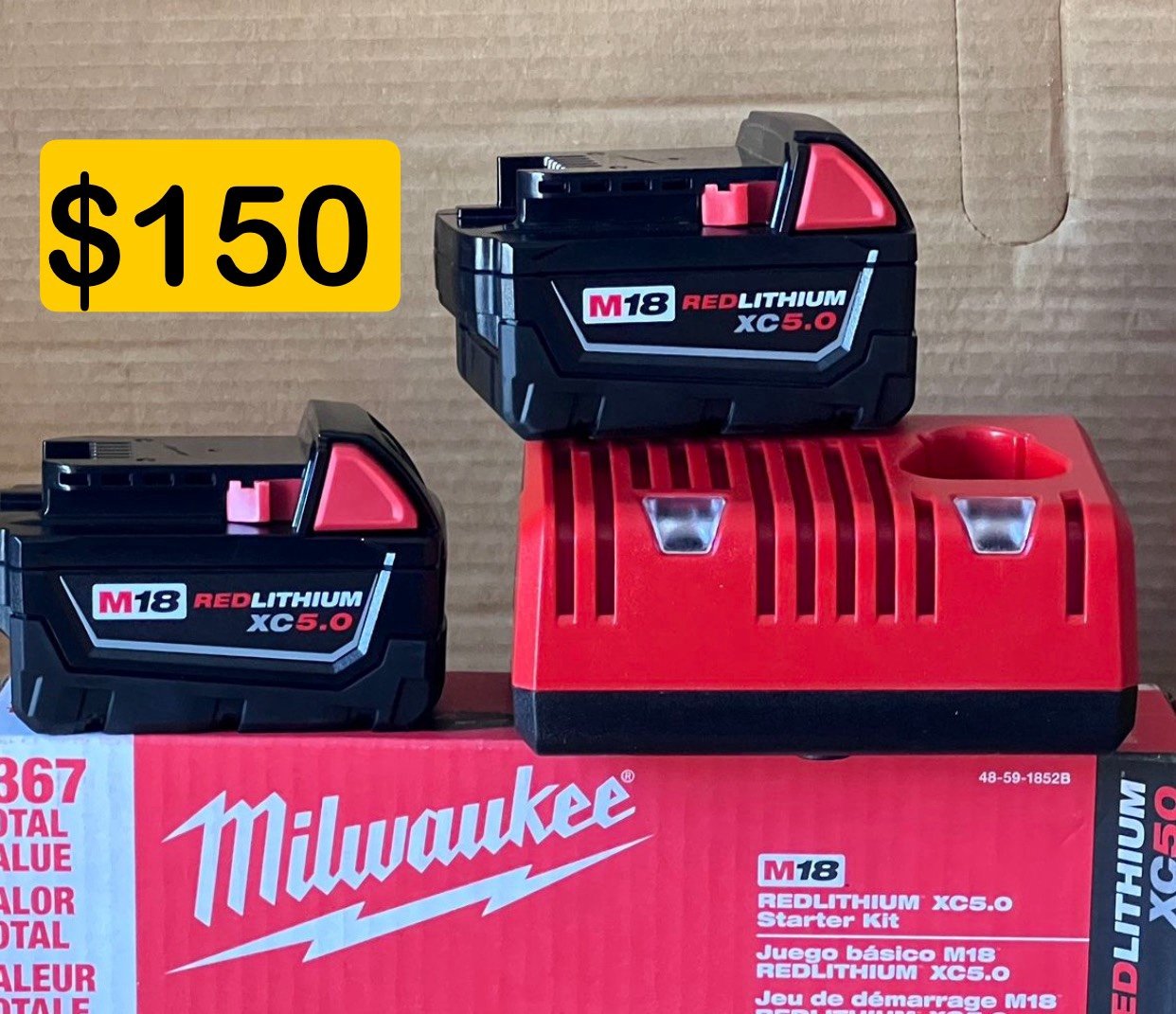 Milwaukee new batteries 5ah (2) and charger M12-M18