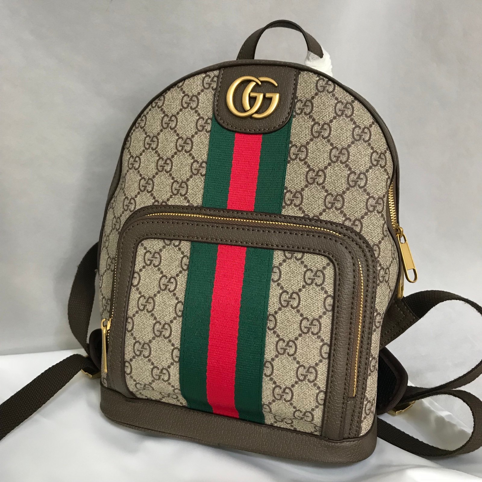Red and green webbing backpack