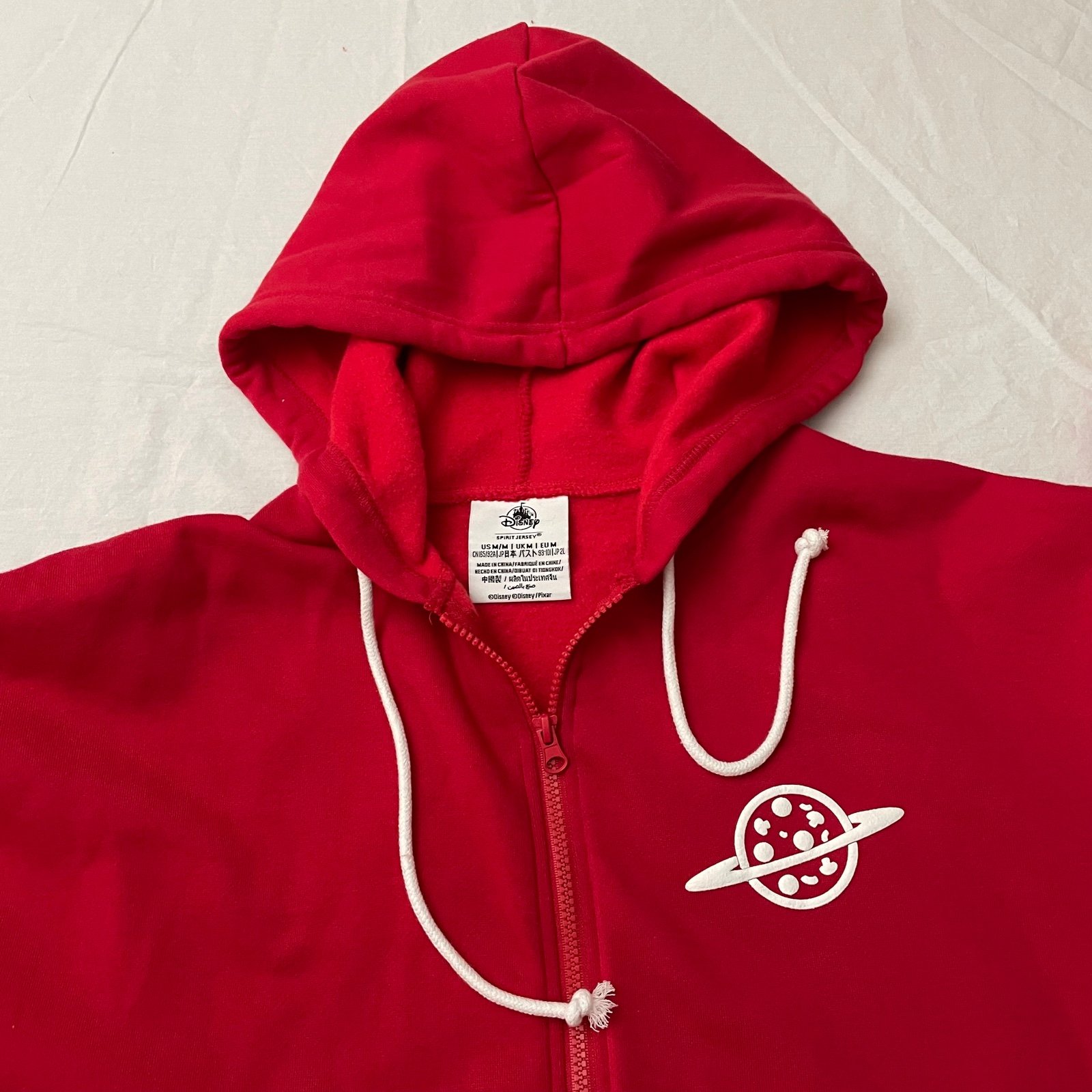 NWOT shops 2022 Disney Parks Pixar Toy Story Red Hoodie Pizza Planet Spirit Jersey M.