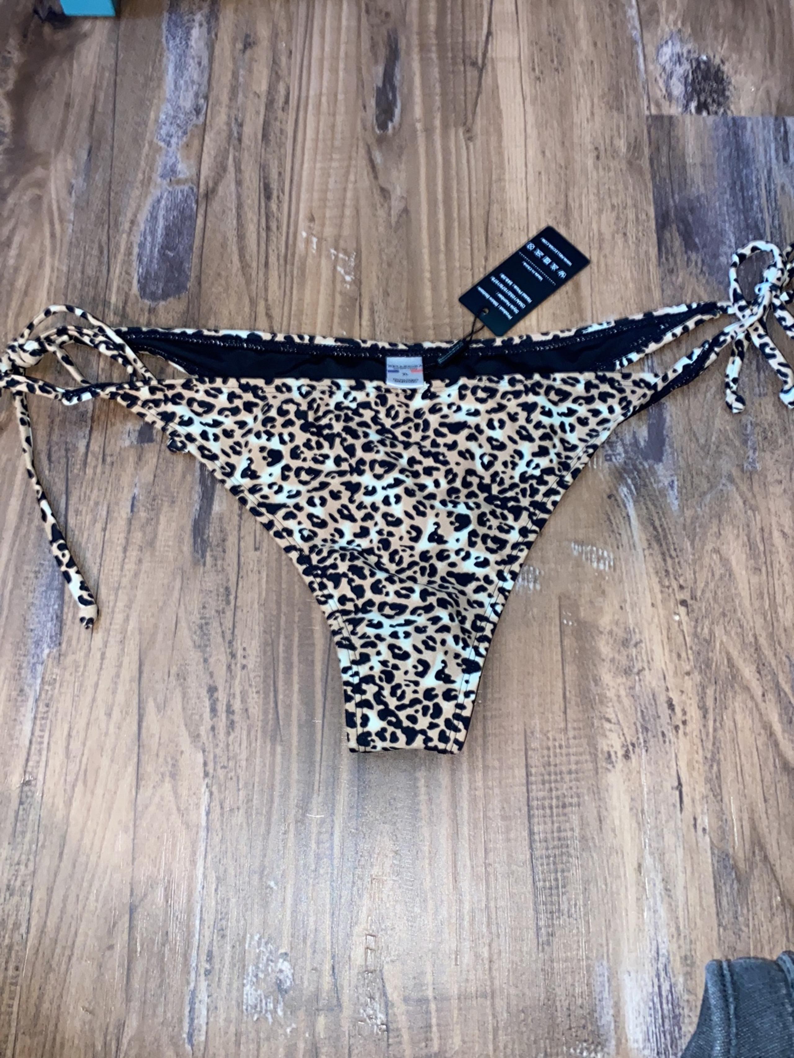 Relliciga women’s size XL leopard print tie side thong bikini bottoms