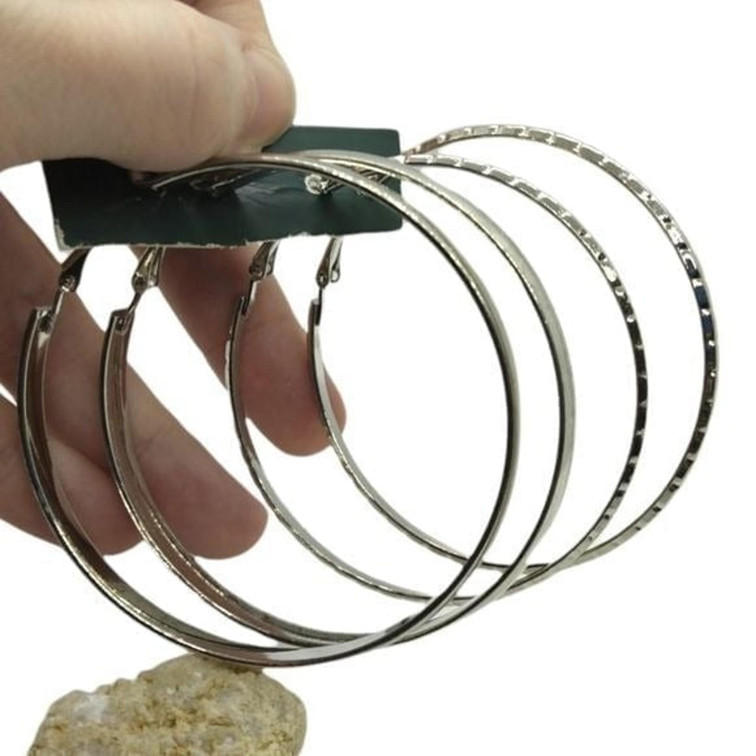 Two pairs of silver hoops so 1990s