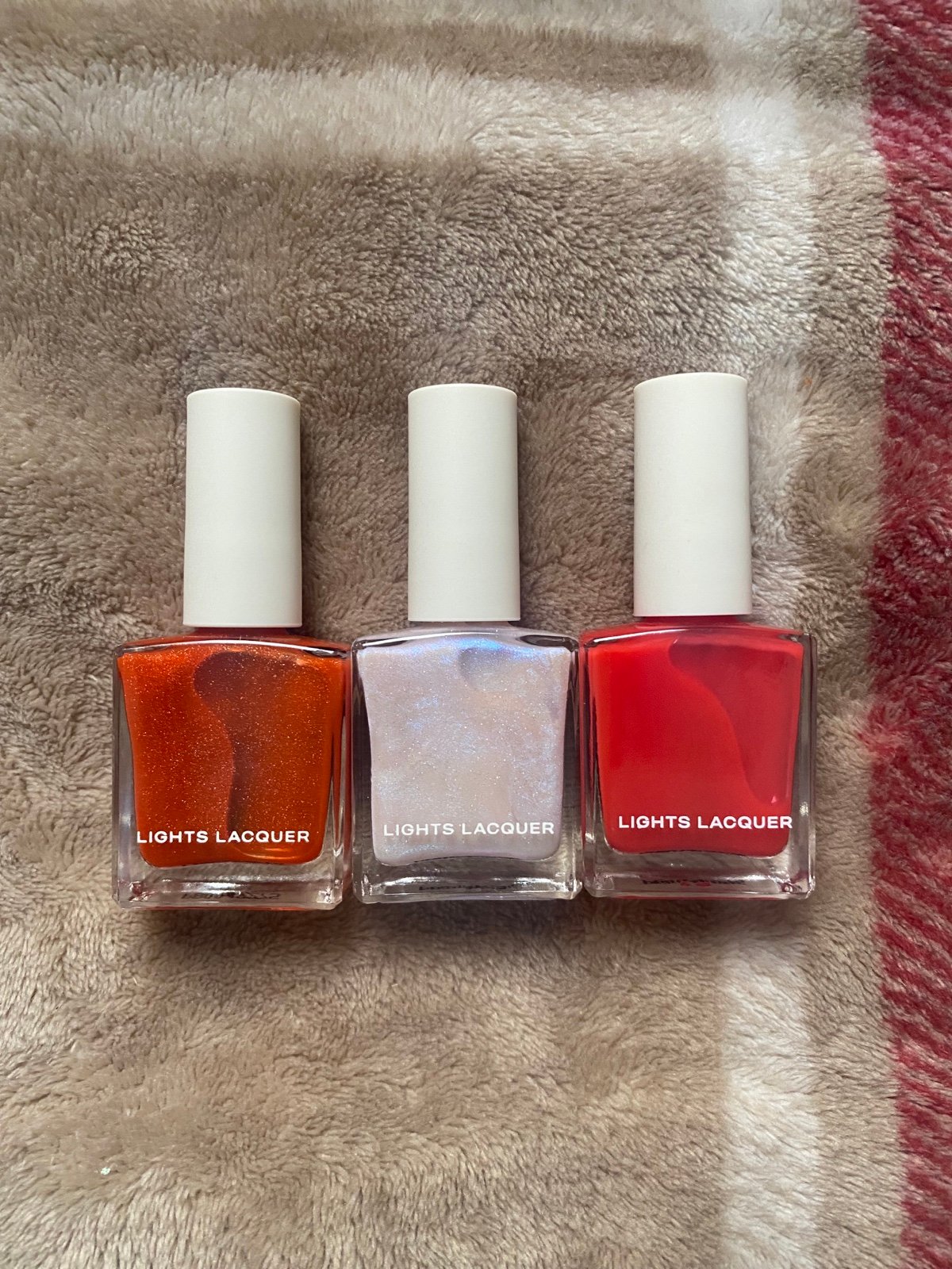 Aperol Spritz, Anyone?” “Angel Baby” “Razzle Red” Lights Lacquer Nail Polish