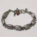 Brighton China Tale Good Fortune mixed metals rectangular link bracelet