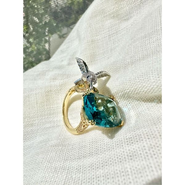 Dark blue hummingbird gold and silver color cubic zirconia adjustable ring