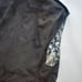 Upcycling a vintage M-65 riders vest by dyeing it.
