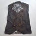 Upcycling a vintage M-65 riders vest by dyeing it.