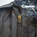 Upcycling a vintage M-65 riders vest by dyeing it.