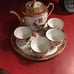 Vintage teapot and matching cups and ser