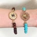 Power gemstone bracelet with Designer button