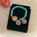 Power gemstone bracelet with Designer button