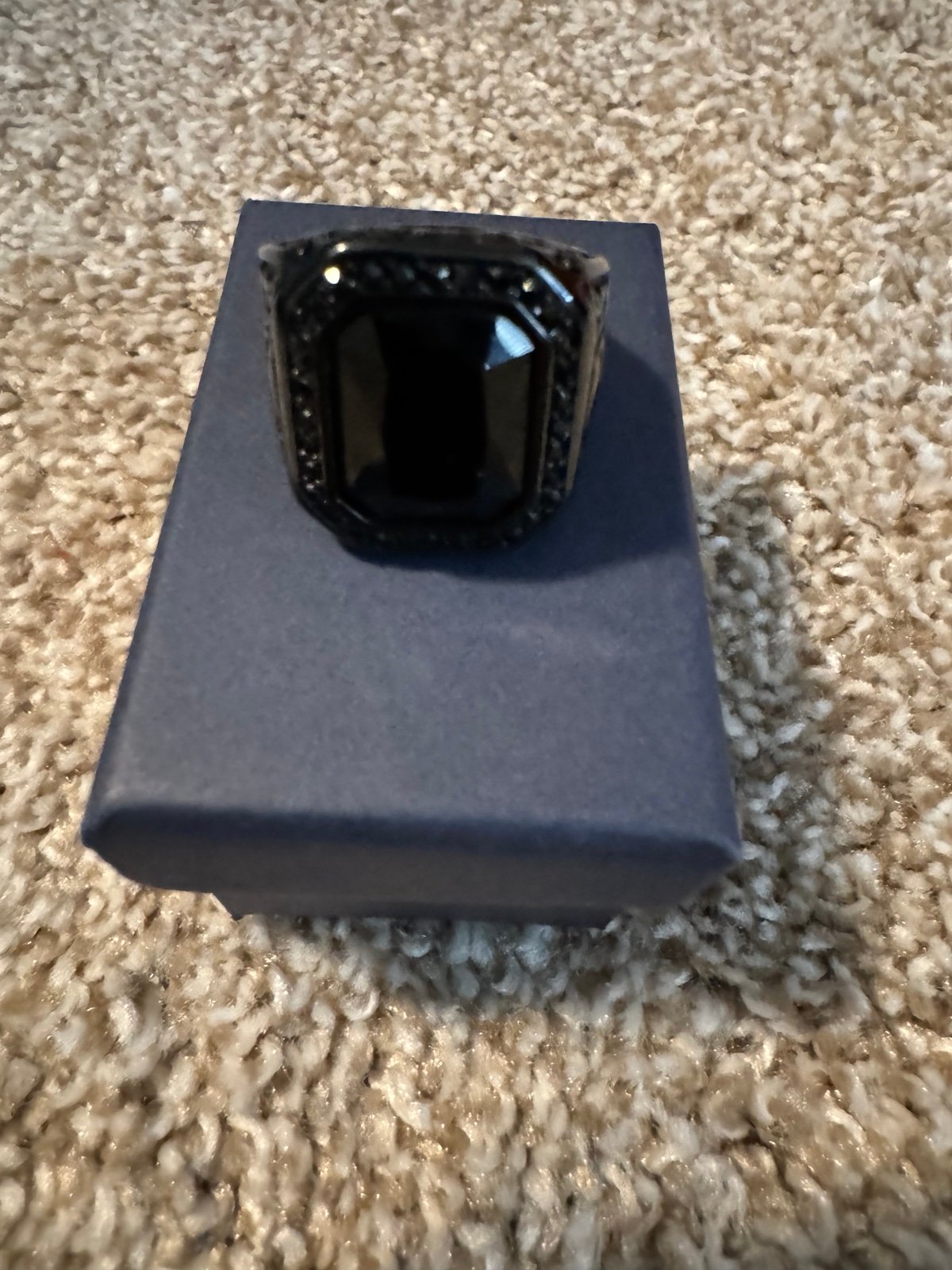 Men’s black onyx ring with skull design