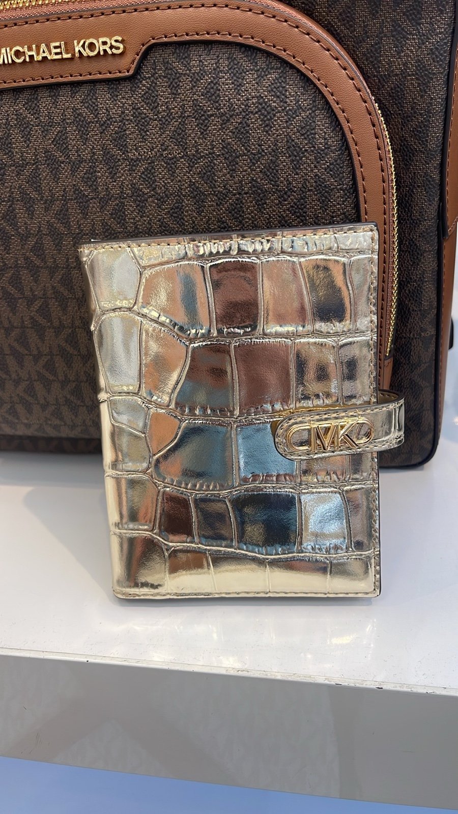 Michael Kors Empire Metallic Crocodile Embossed Leather Passport Wallet Pale Gol