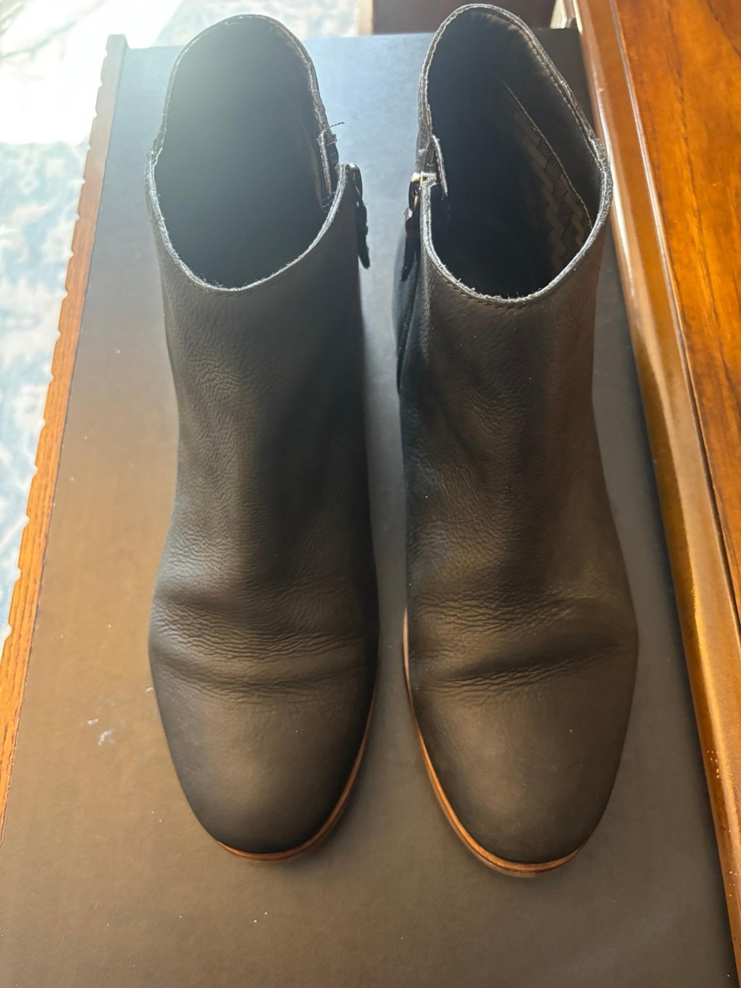 Women’s Cole Haan (10 B) black leather ankle boots.