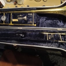 Directors Trombone used in case in fair condition
