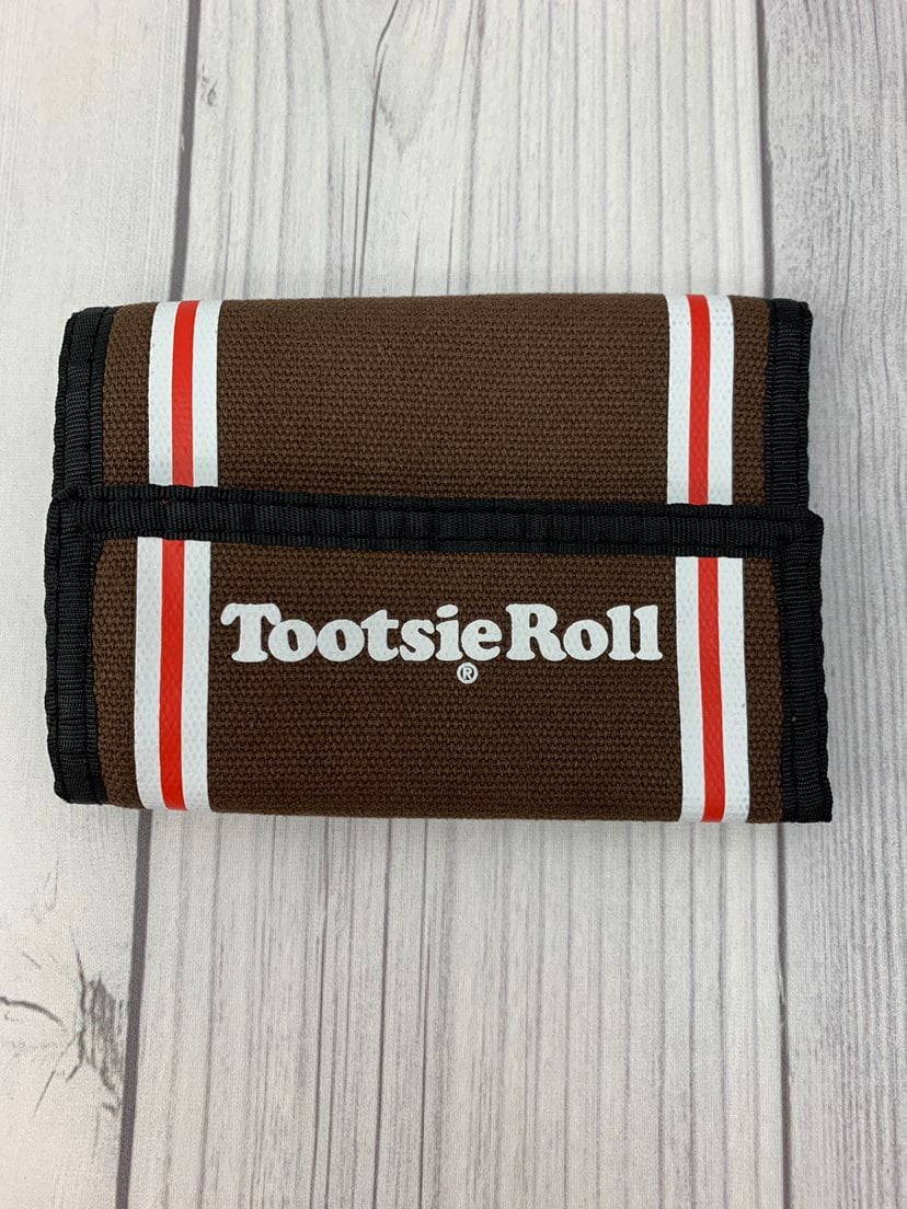 Tootsie Roll they see me Rollin wallet