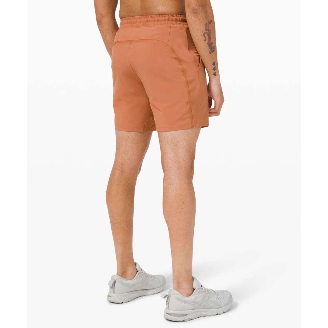 LULULEMON Men's Pace Breaker 7 inch Orangey Brown (desert sun) LINED Size Small